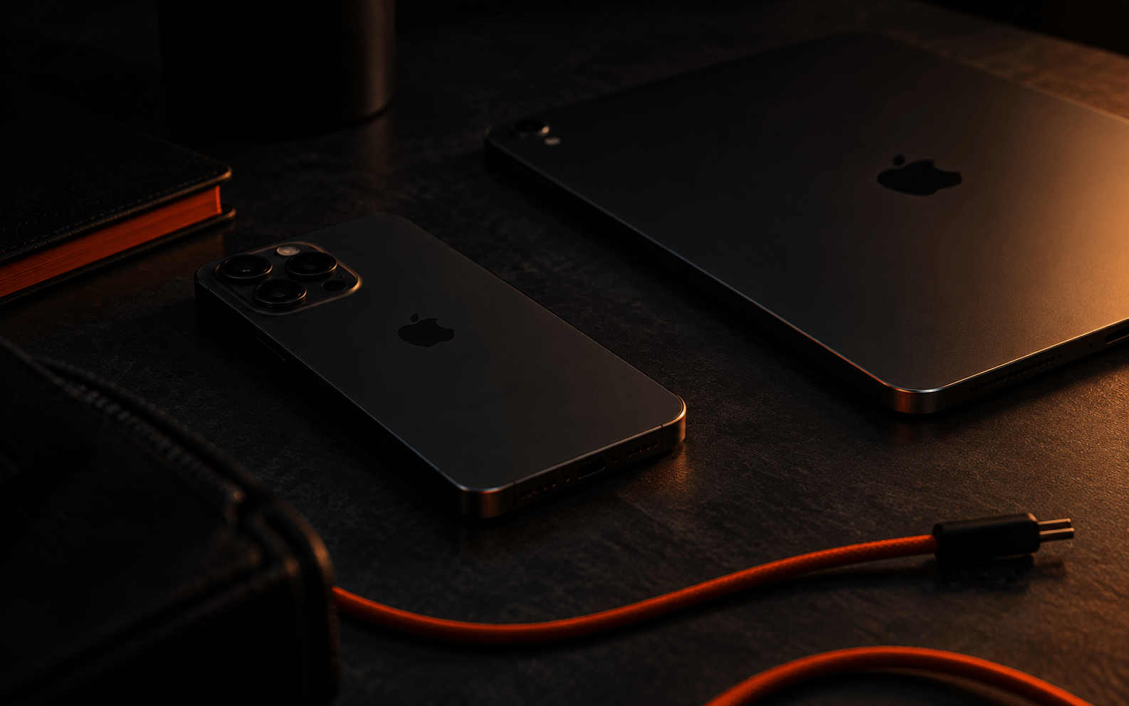Tablet and phone on a dark surface