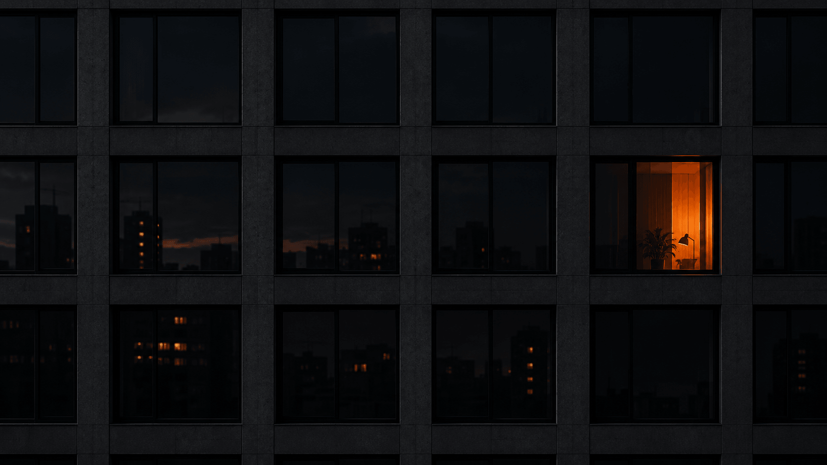 Dark building facade at night